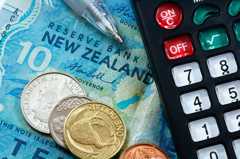New Zealand money and calculator.